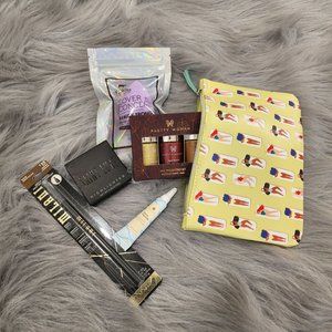 Ladies on the beach Ipsy bag with 4 full size and 1 sample size beauty products